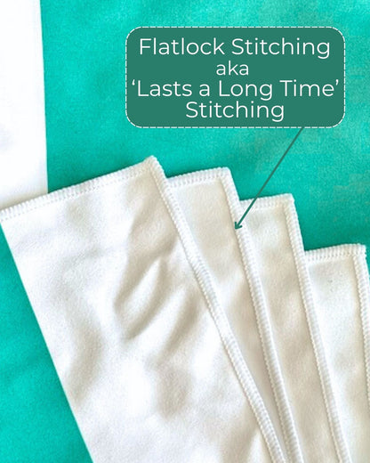 Green and White fabric with flatlock stitching, text overlay about flatlock stitching.